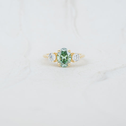 The Tabitha - Coloured Diamond | Oval Moissanite & Lab Diamond Trilogy Ring in Recycled Gold