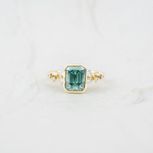 The Zinnia | Green Moissanite Emerald Cut Scattered Accent Diamond Ring