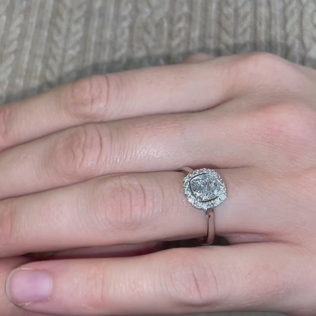 Lovina Cushion cut lab diamond  with halo on models hand