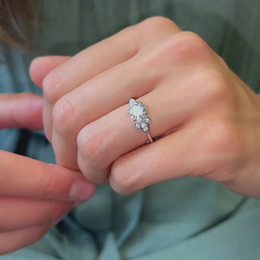 nature inspired leaf blooming flower engagement ring with lab grown carbon negative sustainable diamond wedding jewellery from cornwall