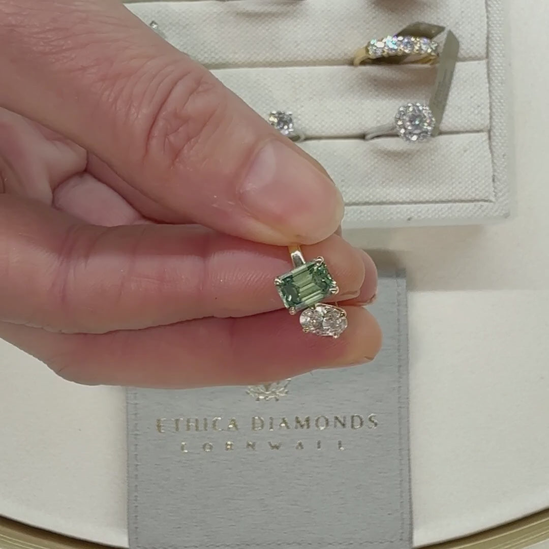 The oriana by ethica diamonds emerald diamond green moissanite and lab grown toi et moi engagement ring