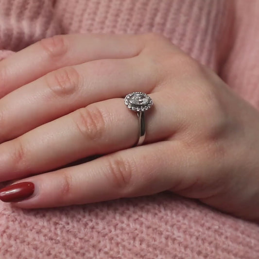 Woman wearing Oval Cut Engagement Halo from Ethica Diamonds