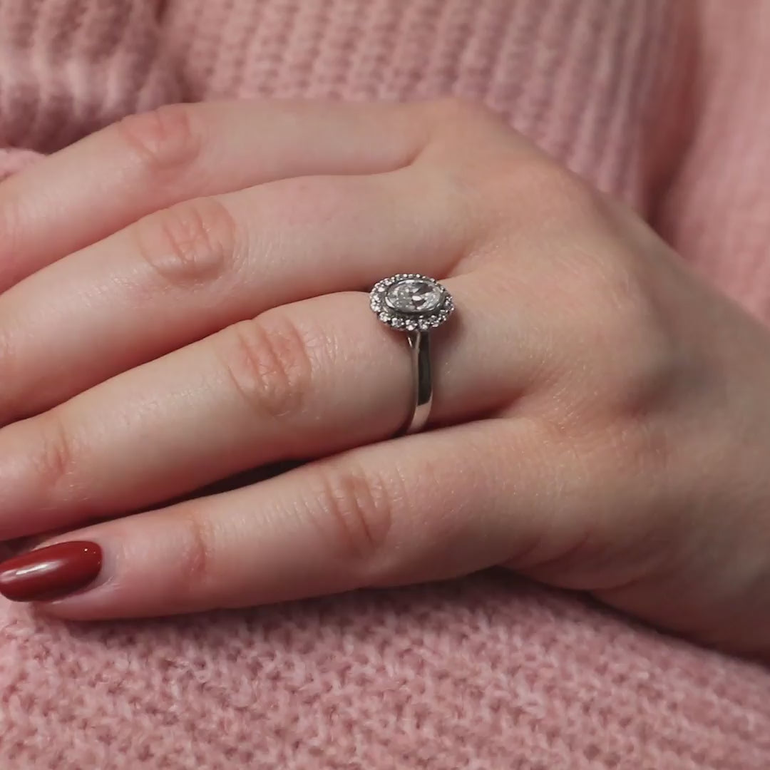 Woman wearing Oval Cut Engagement Halo from Ethica Diamonds