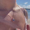 The Ninette Pendant | 2.97ct Round Blue Moissanite & Lab Diamond Halo 9k Yellow Gold