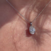 2.0ct classic oval diamond pendant in platinum on ladies neck