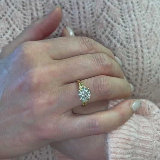 The Sabine Vintage Engagement Accented Ring shown on models hand