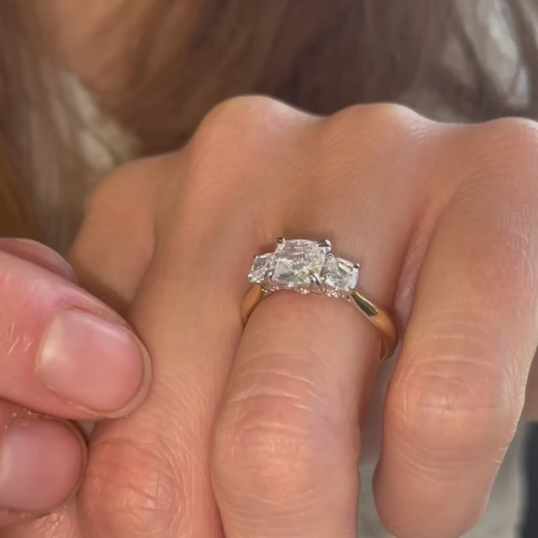 Video of Three-stone cushion lab diamond engagement ring in recycled gold – The Lara Ring