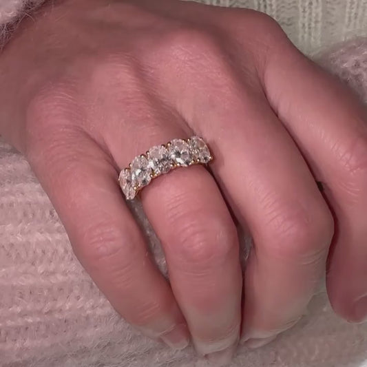 model wearing 5 stone ethical diamond ring set in yellow gold. Luxury eco friendly jewellery made in cornwall