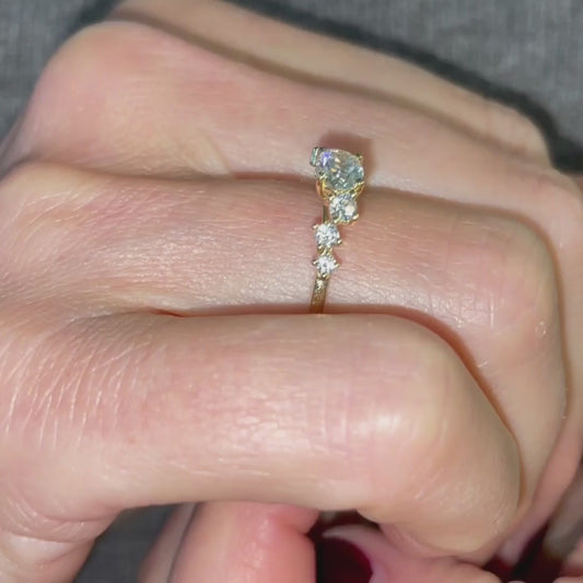 The Sophie Oval Accented 0.50ct Ring worn on ladies hand with an East West set