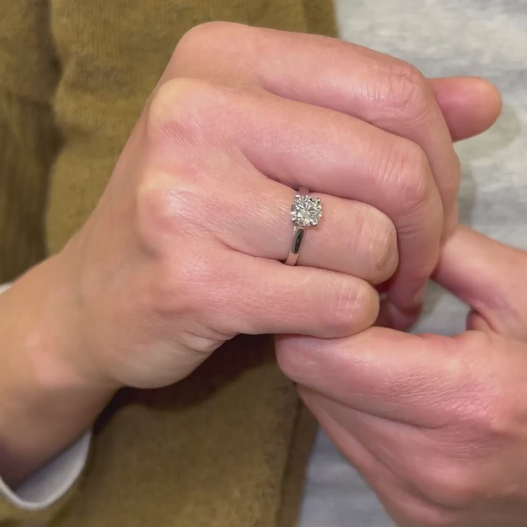 model wears cornish luxury diamond jewellery made by ethica diamonds in platinum - lab created diamond solitaire ring 