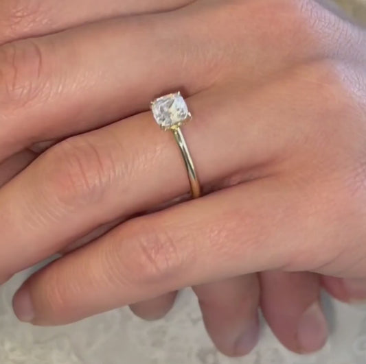 video Close-up of Leola Ring showing cushion cut centre stone and delicate pavé diamonds