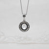 white gold round halo pendant rear view
